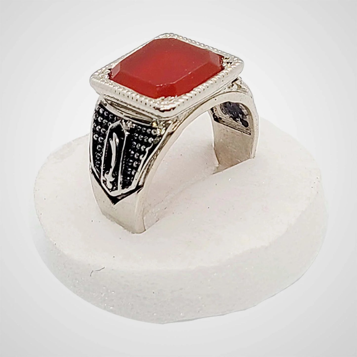 Front view of handcrafted brown aqeeq ring in pure silver featuring square agate stone and Zulfiqar design