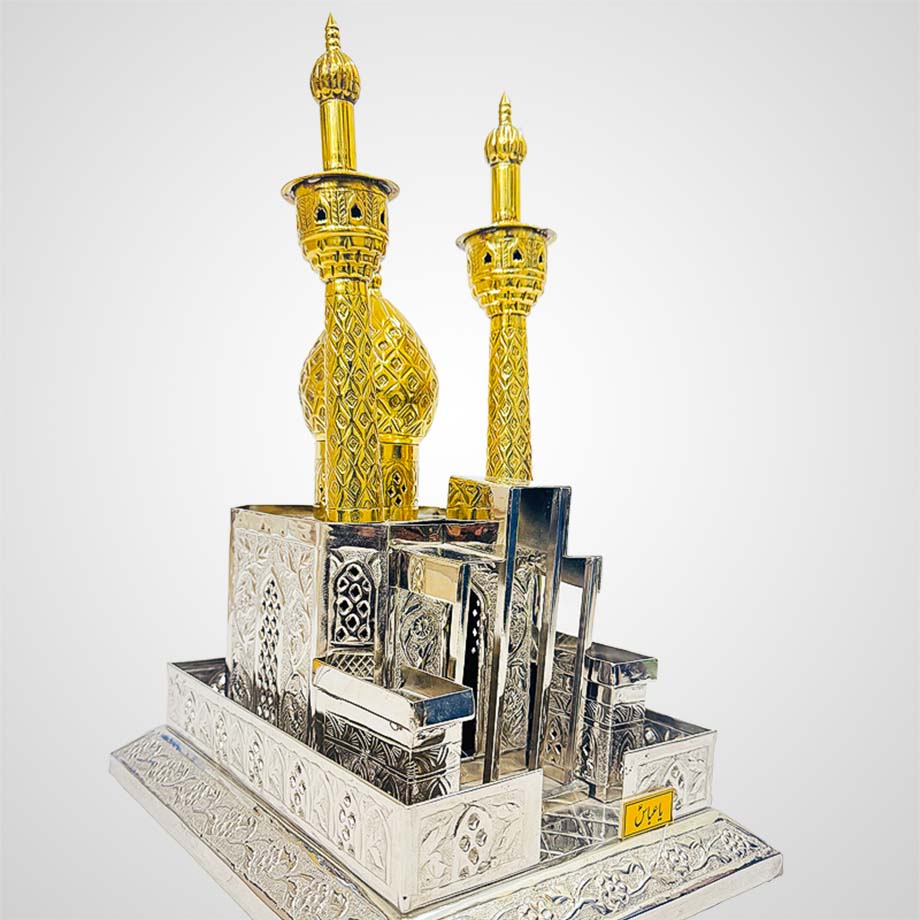 Detailed close-up of handcrafted zarih of Mola Abbas (as) showing intricate silverwork and golden name