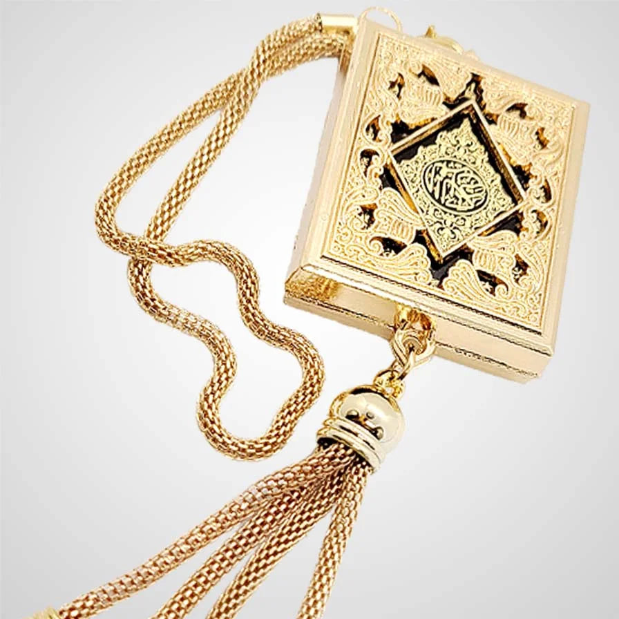 Golden mini Quran hanging from car mirror, perfect Islamic car hanging for protection and blessings while driving