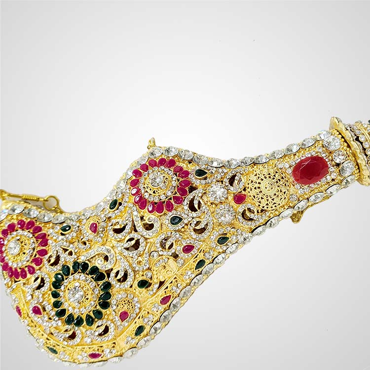 Close-up showing top red stone detail on golden Mashq for Bibi Sakina, used with Hazrat Abbas Alam in religious processions
