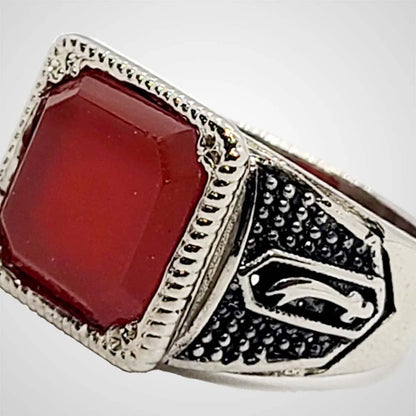 Side angle of dark brown aqeeq stone ring set in silver, showcasing intricate handmade detailing for men